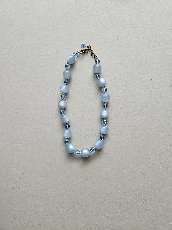 Bracelets: Hellblaues Perlenarmband – D'occasion à Zürich par Nistiman