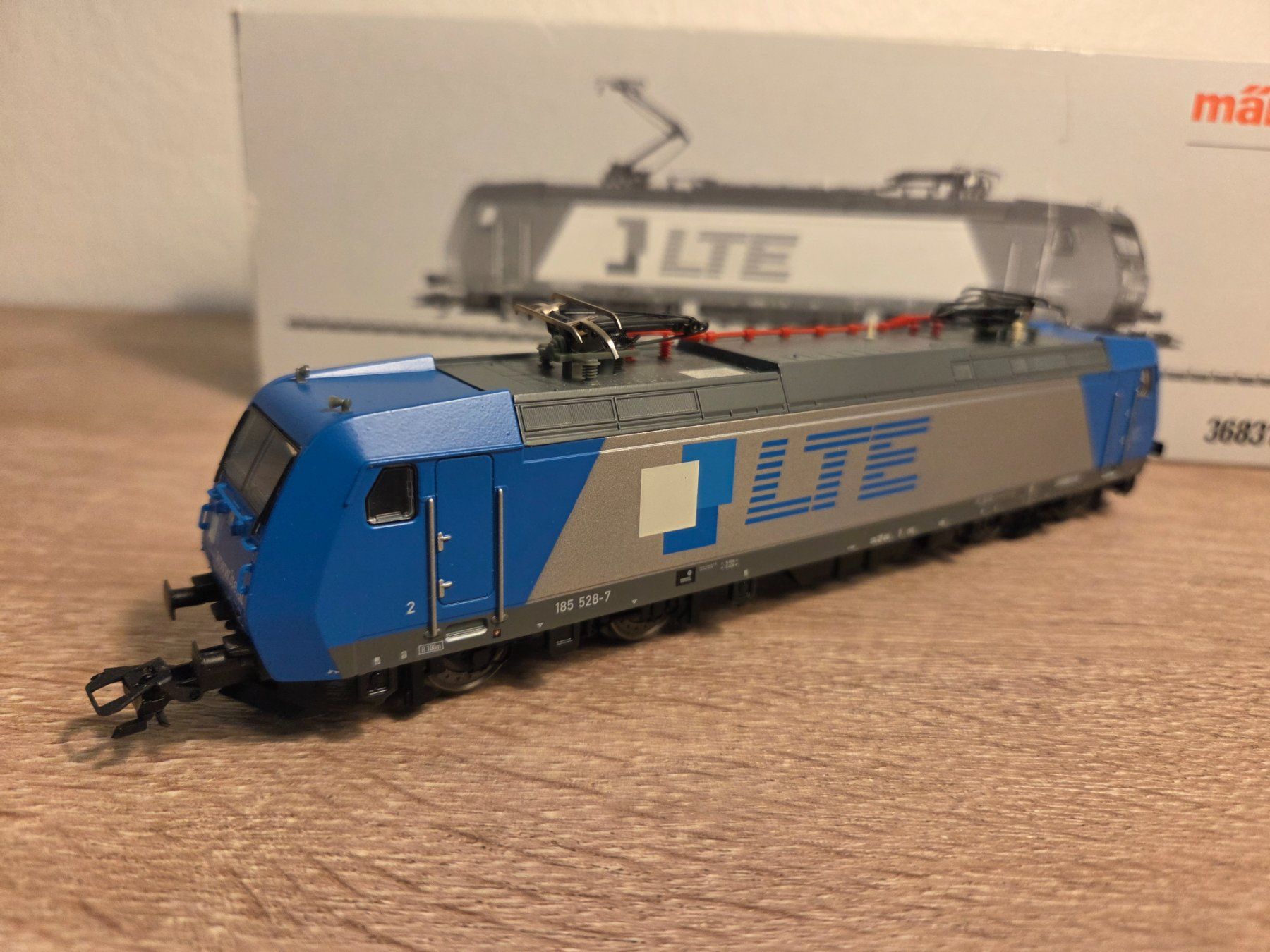 Märklin Modellini di ferrovie: Märklin 36831 E-Lok BR 185 LTE Digital H0 – Nuovo e nell'imballaggio originale da St-Aubin-Sauges venduto da Lo_Go 2