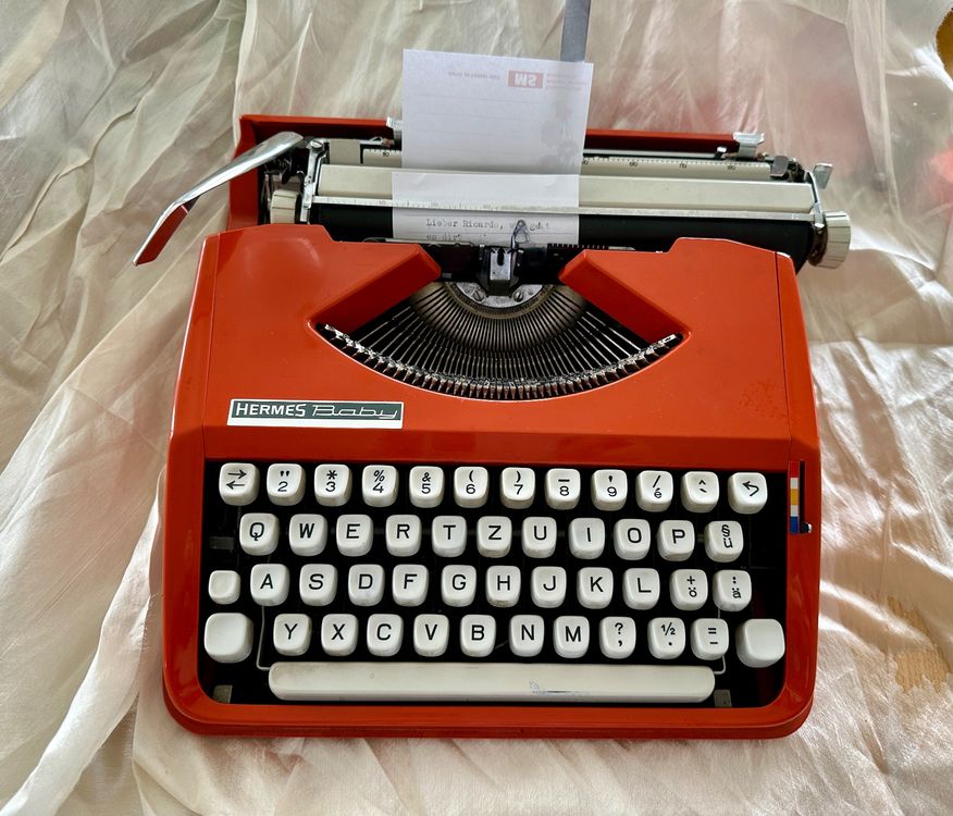 Hermes Baby, orange Kaufen auf Ricardo