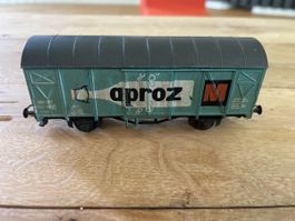 Eisenbahnwagen mit Reklame, Werbung von Aproz Migros SBB