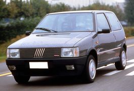 FIAT - UNO TURBO i.e. 1987  FULL OPENINGS grau 1/18 NEU