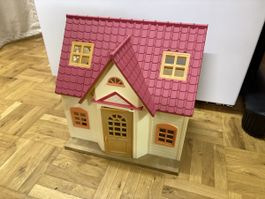 Puppenhaus mit viel Zubehör, gut erhalten