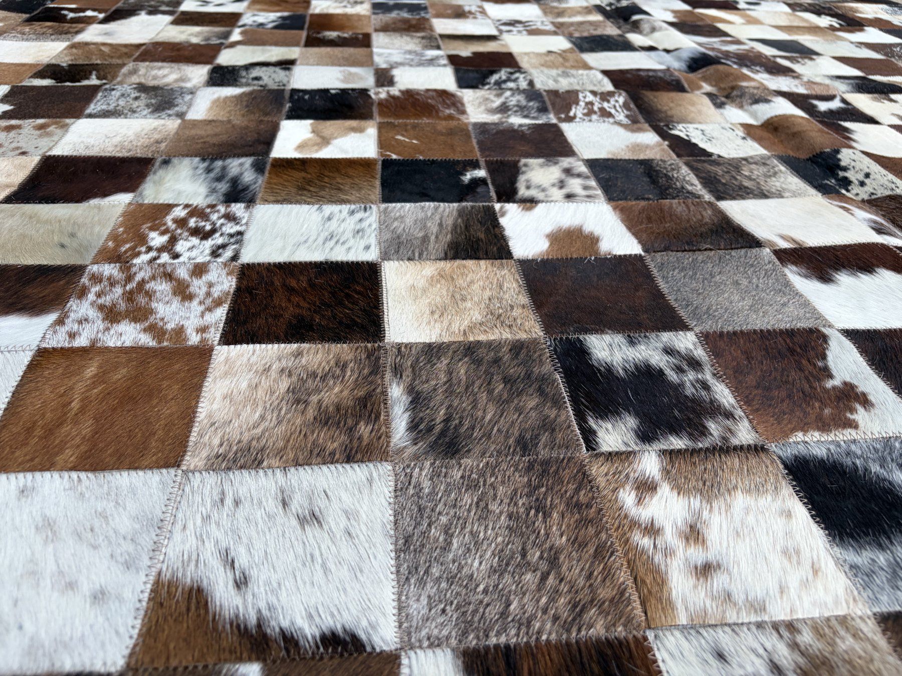 Teppiche: Kuhfell Teppich Patchwork – Neu und originalverpackt aus Arbedo von patagonialeatherrugs 4