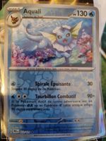 Carte pokémon holo. rare de la série Évolution Prismatique
