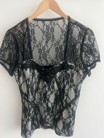 Schickes schwarzes Spitzenoberteil, Grösse 40