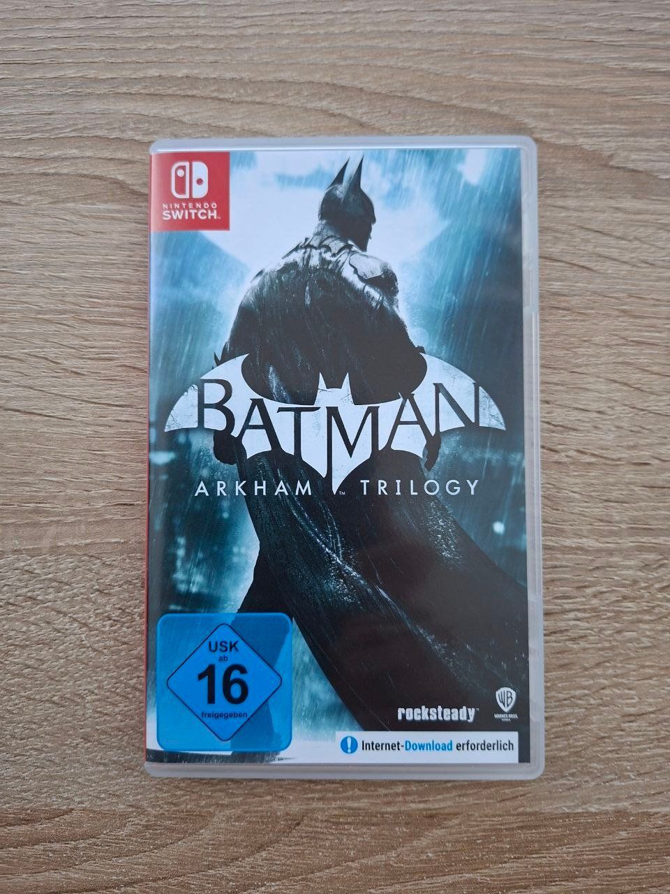 Nintendo Spiele: Batman Arkham Trilogy – Neu (gemäss Beschreibung) aus Lyss von realstyle
