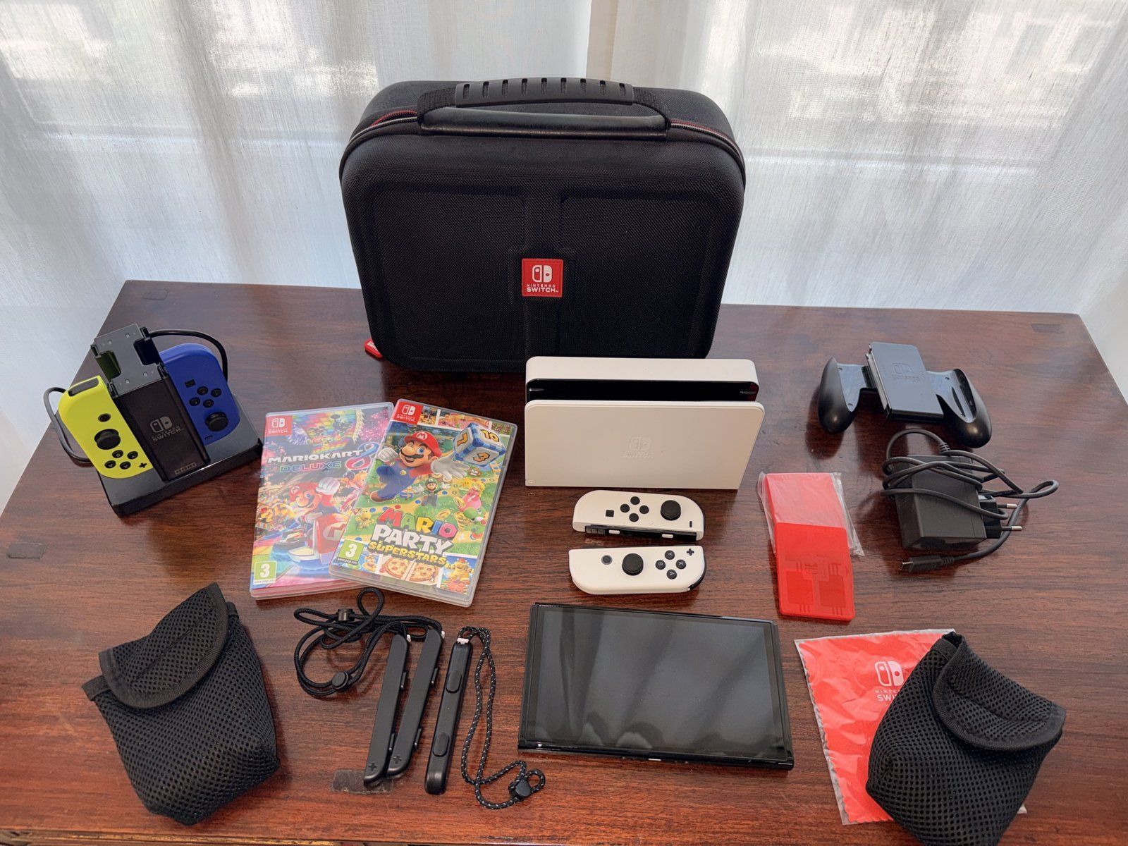 Nintendo Console: Switch OLED Weiss + 4 Joy-Con + 2 Games + Case – Usato da Zürich venduto da swizzmember
