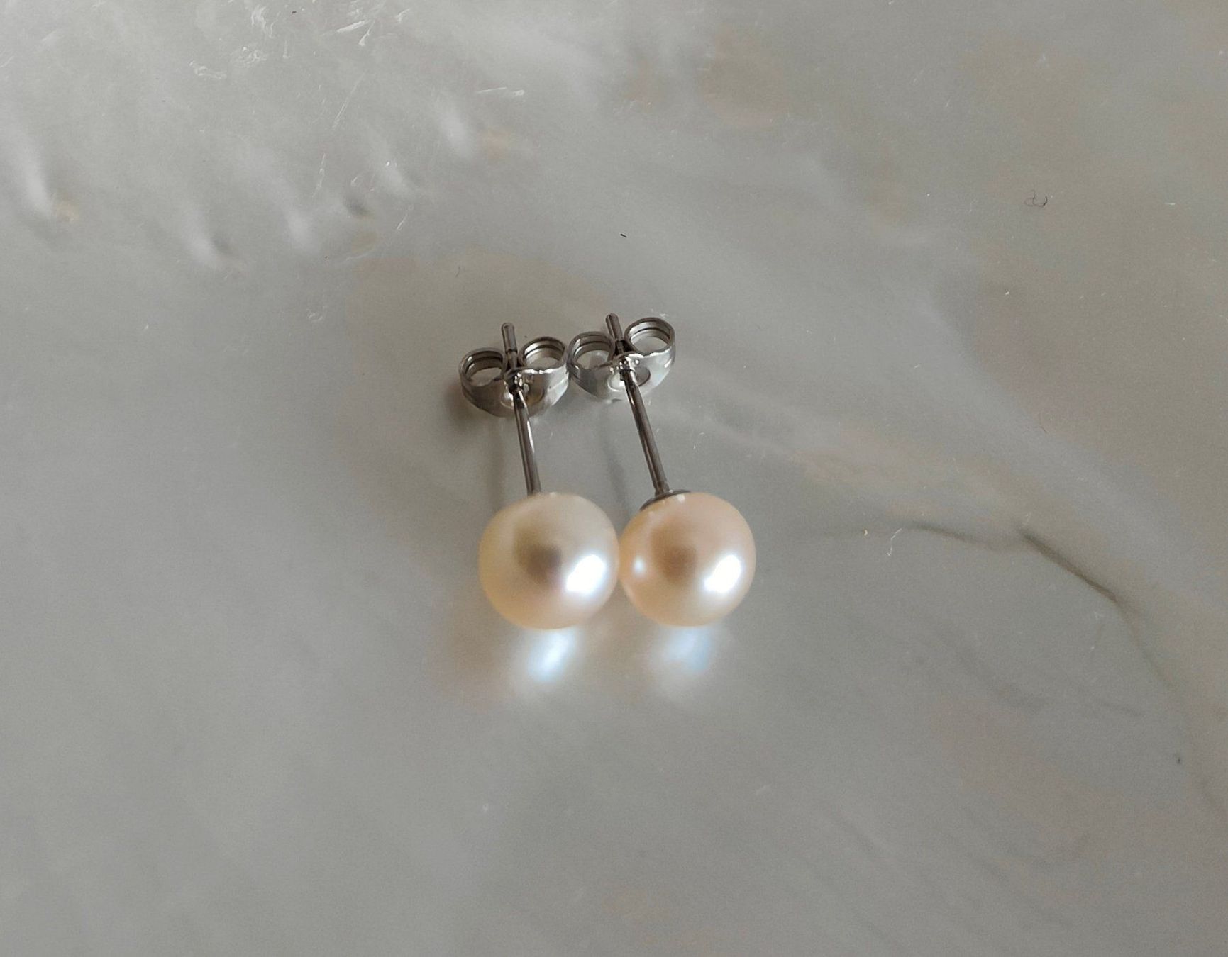 Orecchini pendenti & Orecchini a lobo: Süsswasserperle Ohrstecker 7mm, apricot – Nuovo e nell'imballaggio originale da Rümlang venduto da 21f 2