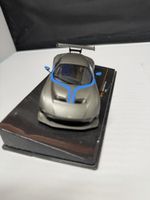 Modellauto Aston Martin Vulcan 2015 grau blau auf Sockel