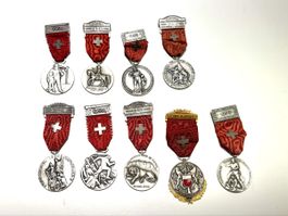 9 Schweizer Schützenmedaillen / Schiessmedaillen Konvolut 