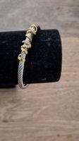 bracelet cable avec motif doré