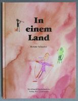 In einem Land - Bilderbuch von Renate Schaefer