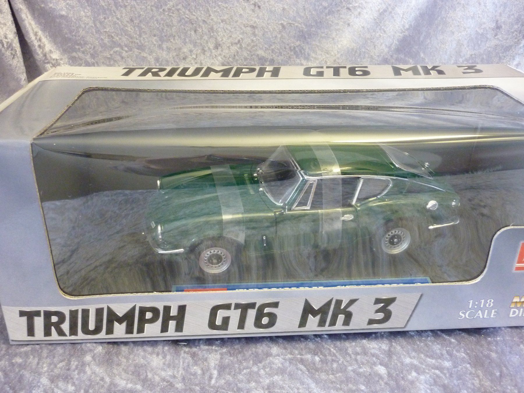 Triumph Modellini d'auto: Triumph GT6 Mk3  1:18 – Nuovo e nell'imballaggio originale da Dürrenäsch venduto da modellautos4you 1