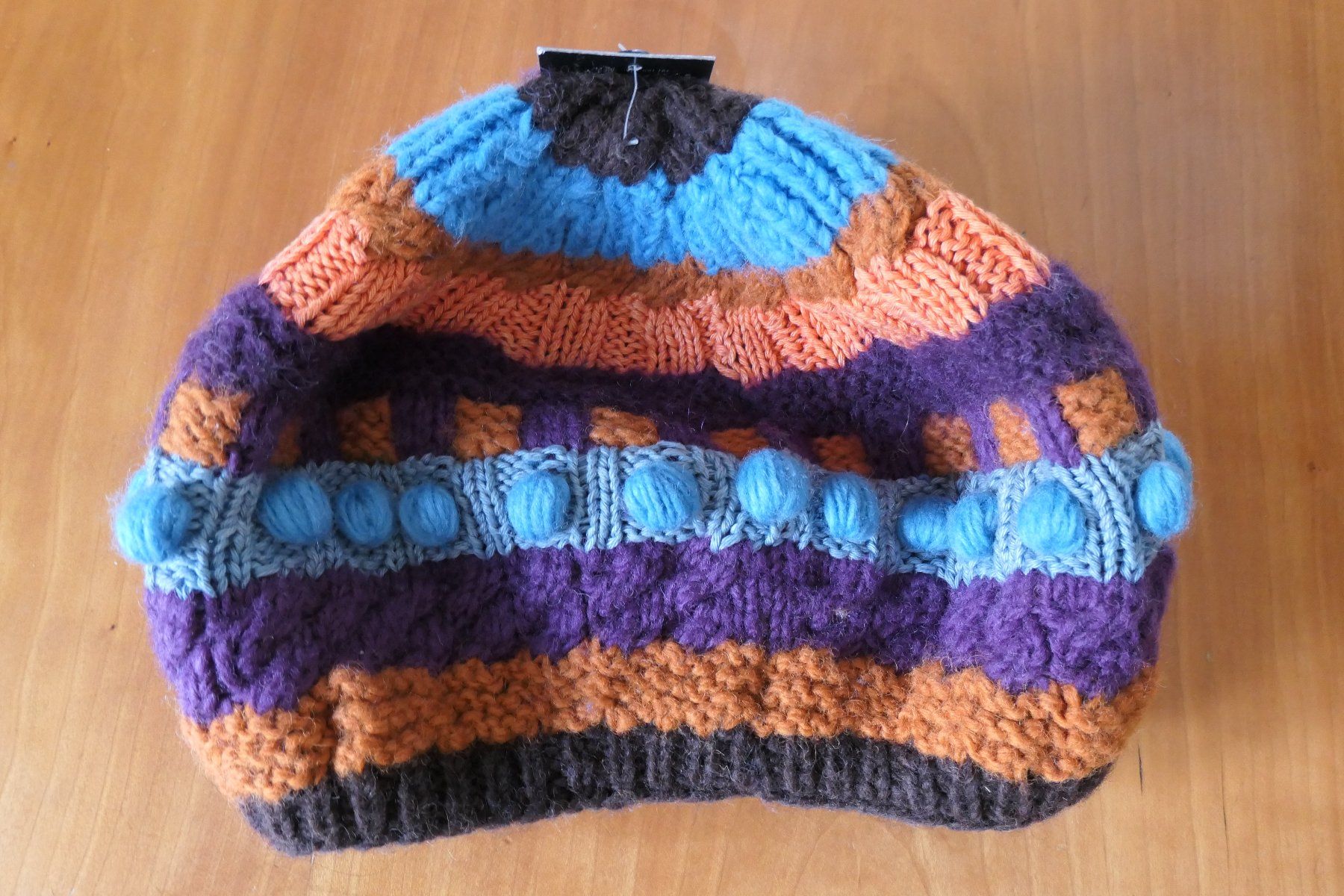 Copricapi, berretti & cappellini: Bonnet Moshiki tricoté main – Nuovo e nell'imballaggio originale da Sion venduto da bene123 1