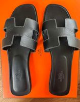 Hermès Oran Sandalen, Gr. 38.5, Farbe schwarz