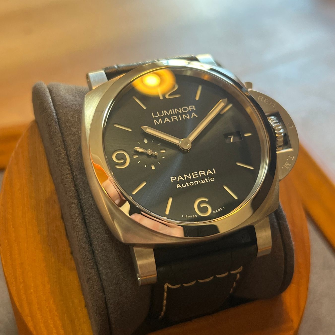 Panerai Uhren: Panerai Luminor Marina Blue Dial PAM01313 – Gebraucht aus Carouge GE von Watchaser 1