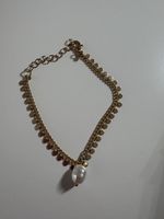 Elegantes Gold-Armband mit einer Perle