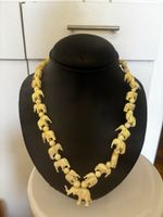 Collier éléphants sculptés vintage bon état