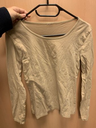 Pull beige leger