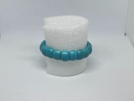 Bracciale elastico di bigiotteria con pietre turchesi venate