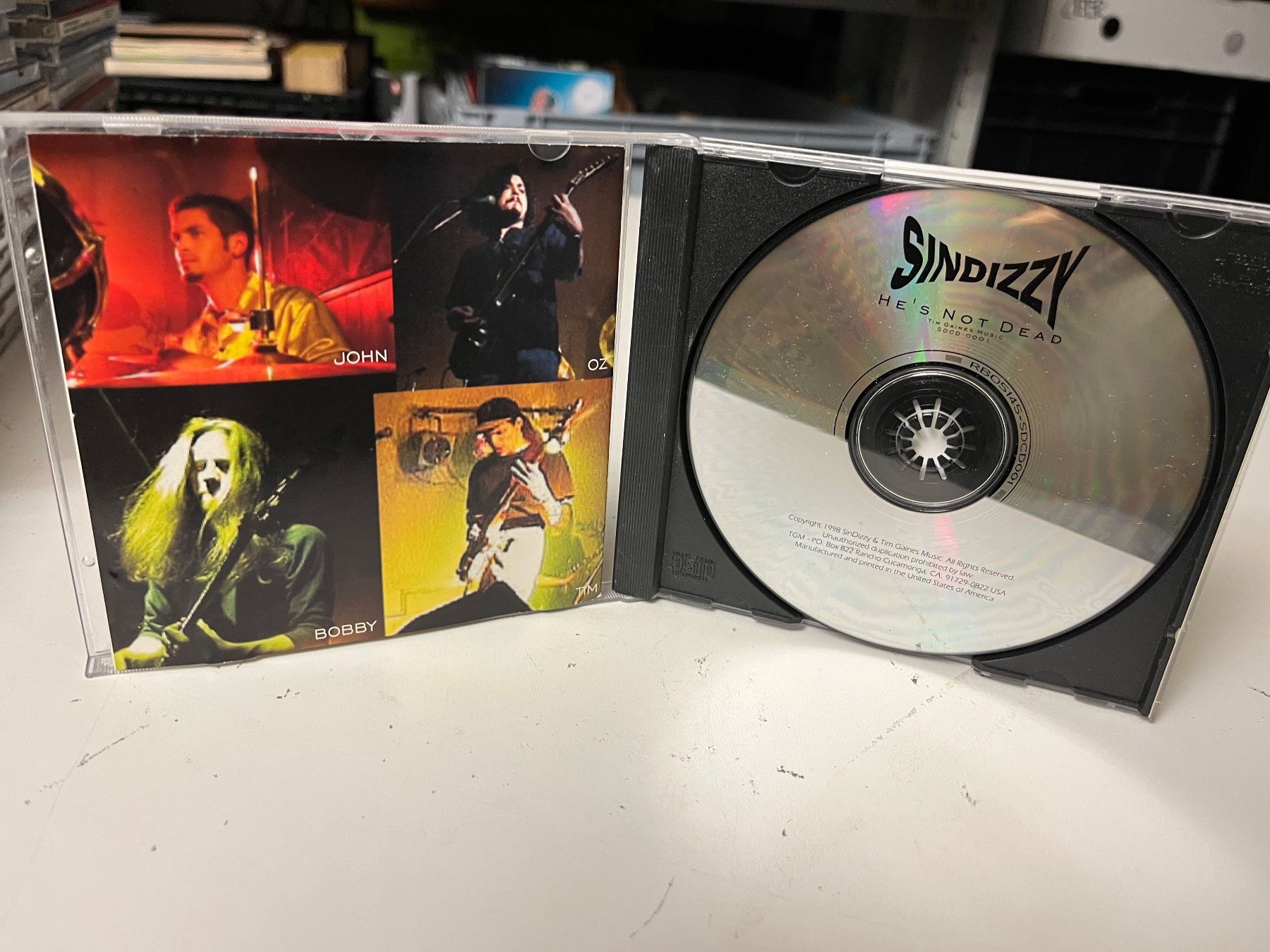 CDs: Sin Dizzy - He's Not Dead - HH22D – Neu (gemäss Beschreibung) aus Küsnacht ZH von swisssales.net 2