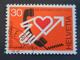 Timbre CH 1975 - (11. IX.) N° 569 - La main tendue