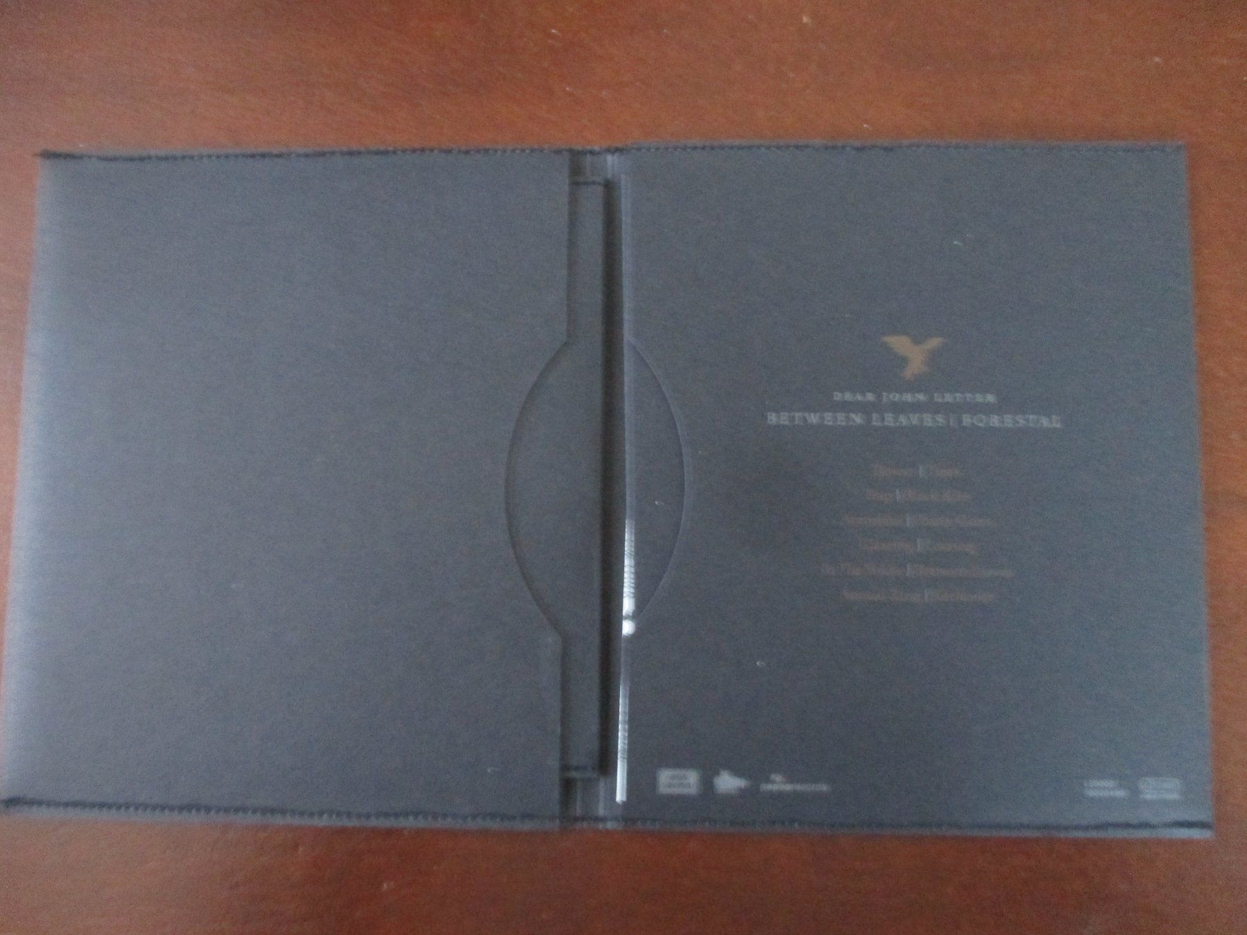 CD: Dear John Letter  -  Between Leaves/Forestal – Usato da Liestal venduto da Disc-Point 1
