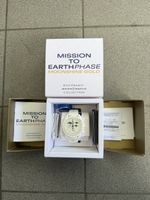 Swatch omega moonshine gold flocon