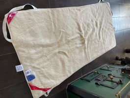Matratzenauflage aus Lammfell