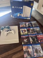 Play Station 4 (PS4 Pro) 1 TB + 2 manettes + 11 jeux 