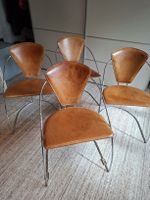 elegante, bequeme Lederstühle mit Stahlgestell