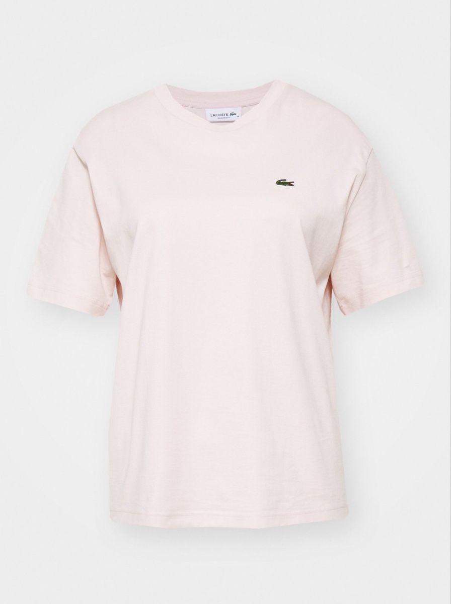Lacoste T-shirts: T-shirt Lacoste Rose Clair – D'occasion à Giffers par ale_zb5w