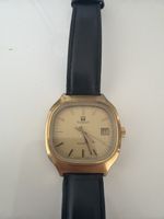 Montre Tissot Quartz dorée bracelet cuir bon état