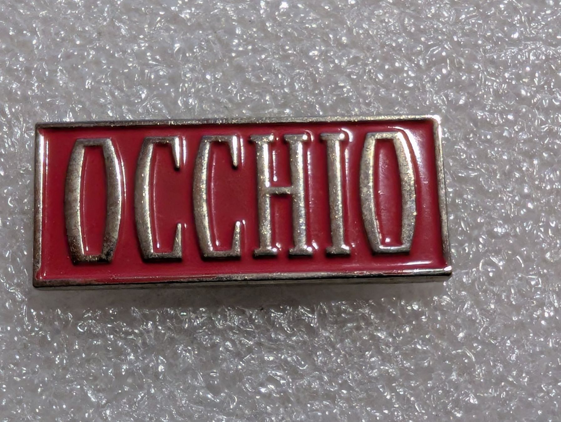 Plaketten & Abzeichen: Ansteckpin 259: Occhio – Gebraucht aus Oppligen von Pin-Fall-Shop