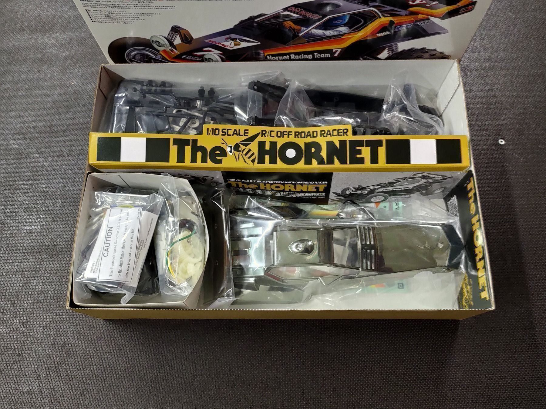 Modellismo RC: Tamiya The Hornet Black Metallic – Nuovo (secondo la descrizione) da Wetzikon ZH venduto da Douglas-MD-11 1
