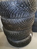 Fast neue Winterreifen Hankook 215/55R17 98V 