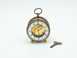 Weckeruhr Matthew Norman 1910 Messing, Skelett - Ref. 07/23