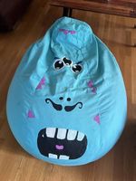 Kindersitzsack mit Monstergesicht