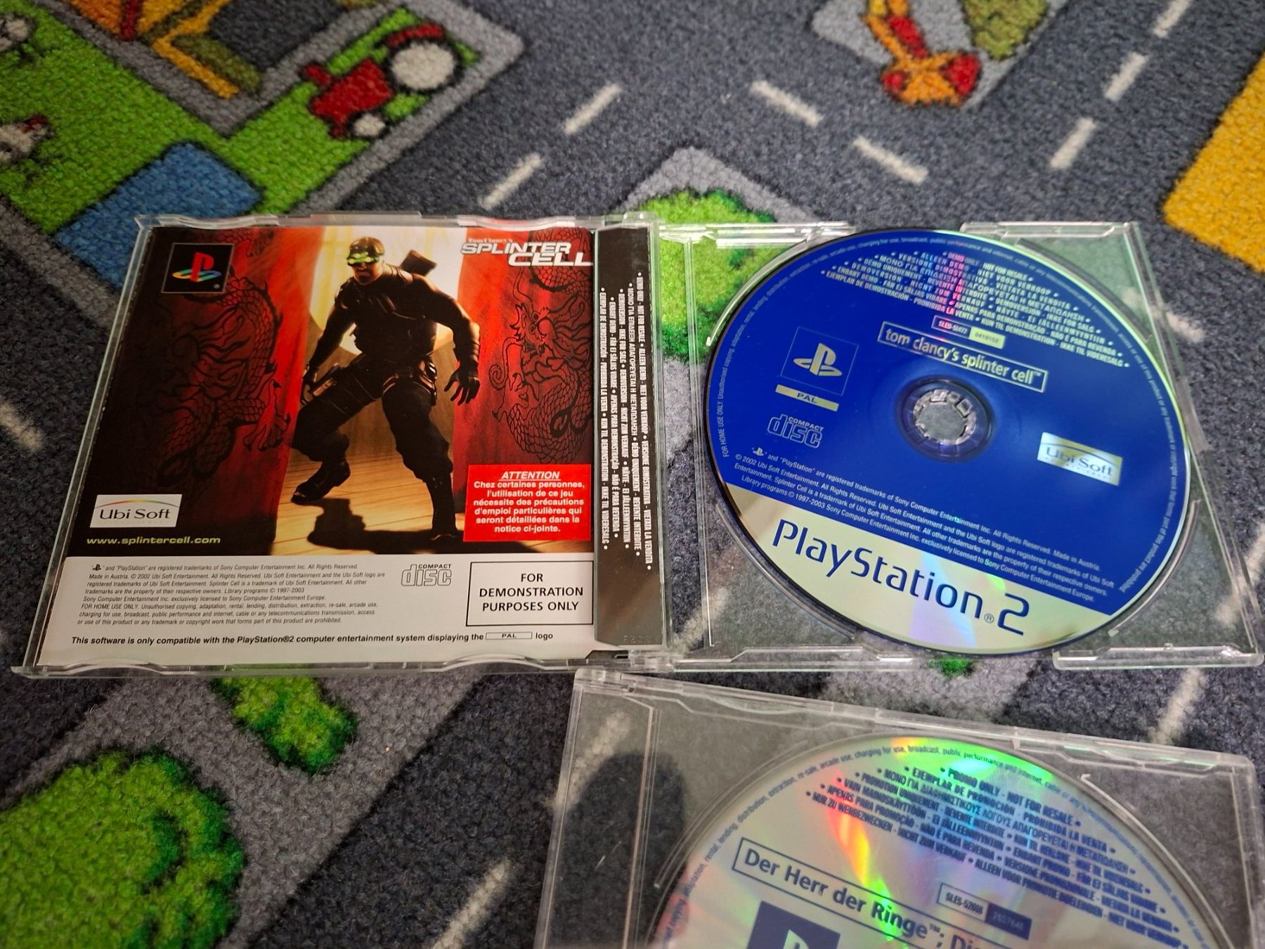 Spiele: Splinter Cell und Herr der Ringe PS2 Promo-Versionen – Gebraucht aus St. Gallen von brat01 1