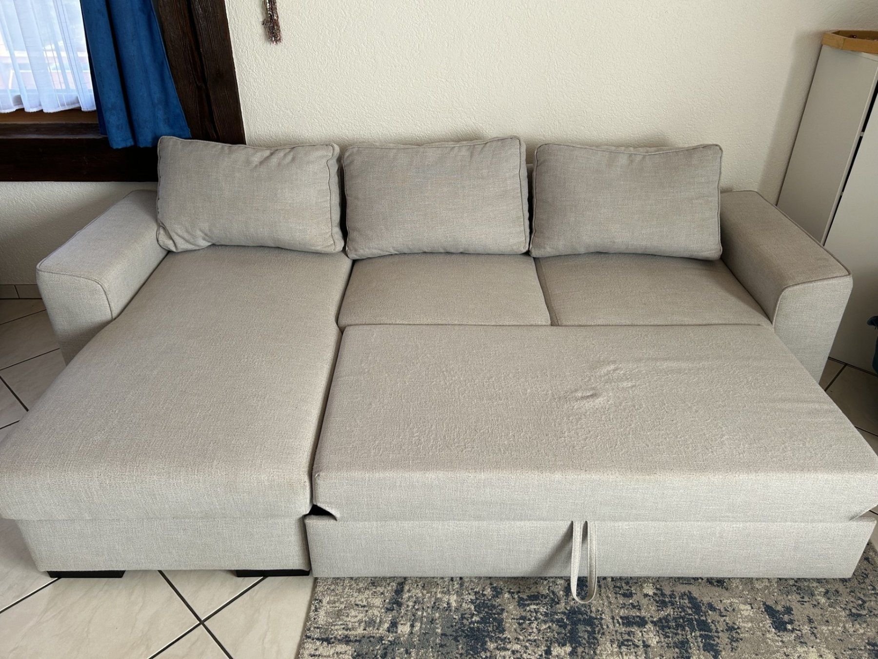 Livique Divani: Schlafsofa mit Bettkasten hellgrau Stoff gebraucht – Usato da Herisau venduto da Rakharo 1