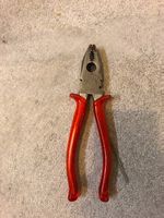 Kombizange mit Drahtschneider  rote Griffe