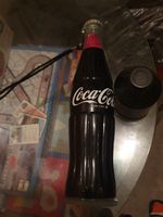 Coca Cola. Regenschirm. Flasche