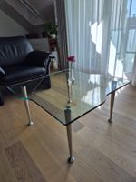 Couchtisch mit Glasplatte