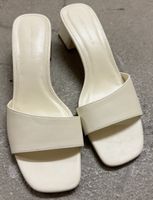 cream heeled mules