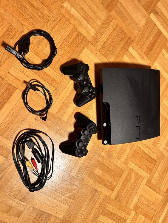 PlayStation 3 + 2 good Controller + Spiele