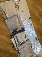 Verschiedene silberne Stoffe zum Nähen & Basteln