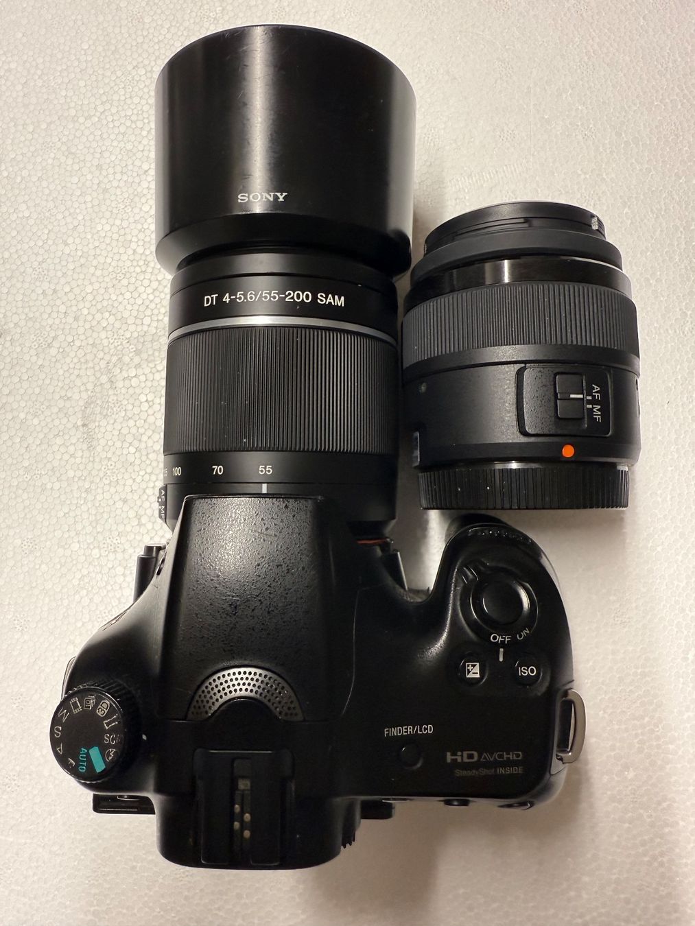 Sony Fotocamera: Sony Alpha 65 Spiegelreflexkamera.+ 2 Objektive + Akku + Lad – Usato da Zürich venduto da pnp_jz9v