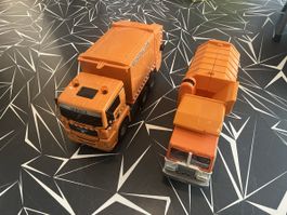 2 Müllwagen Spielzeug orange