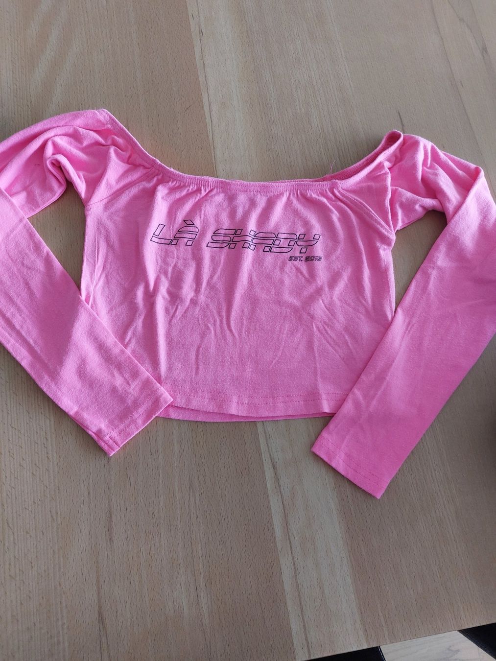 Camicette, T-shirt & Top: Haut gym rose fluo 140 – Usato da Delémont venduto da Petitlutin