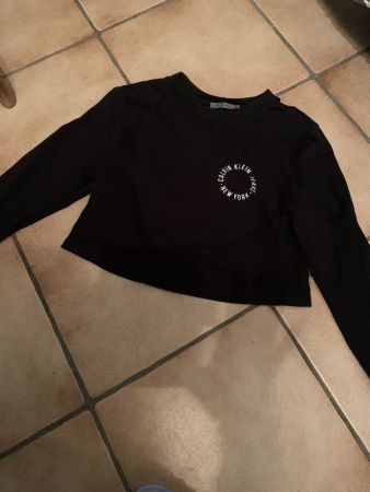 Pull court noir fin Calvin Klein t. S